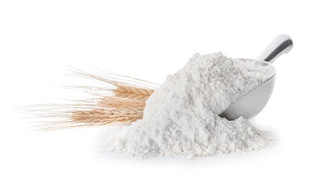 Scoop with flour on white background Photo of Scoop with flour on white background