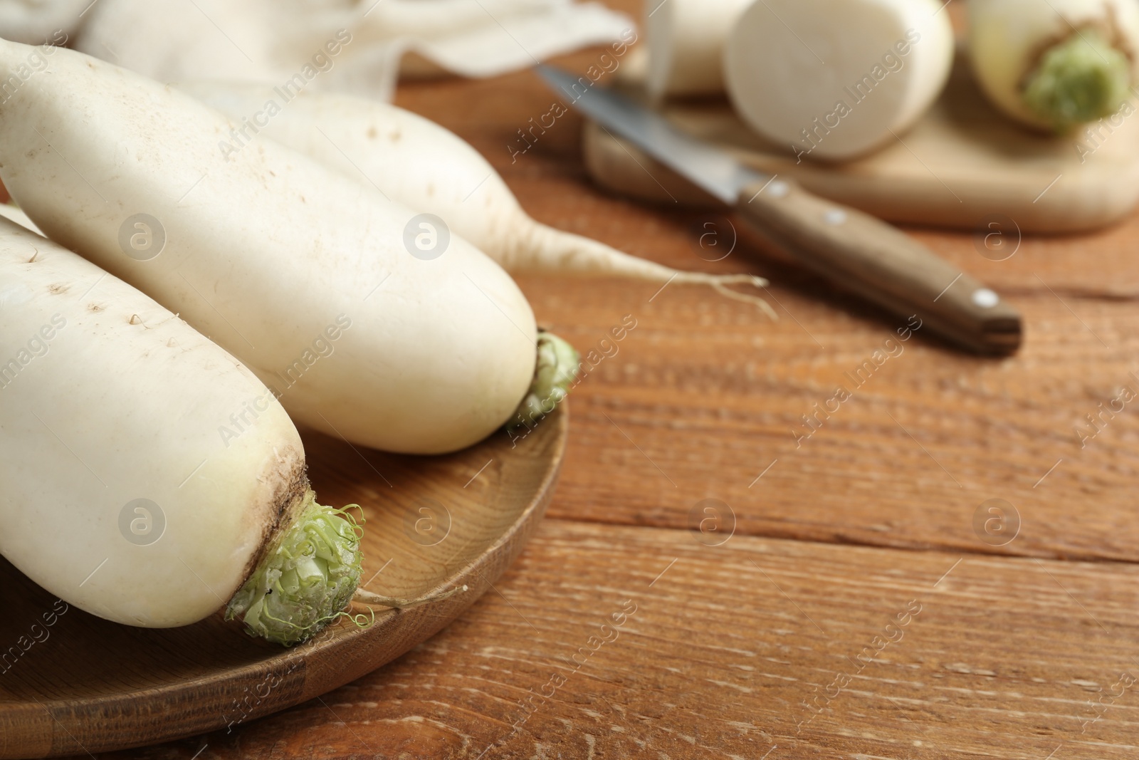White turnips on wooden table, closeup. Space for text Photo of White turnips on wooden table, closeup. Space for text