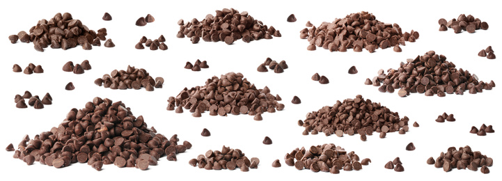 Set of tasty chocolate chips on white background Image of Set of tasty chocolate chips on white background