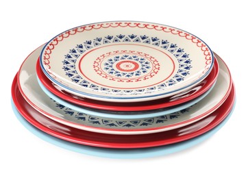 Empty clean ceramic dishware isolated on white Photo of Empty clean ceramic dishware isolated on white