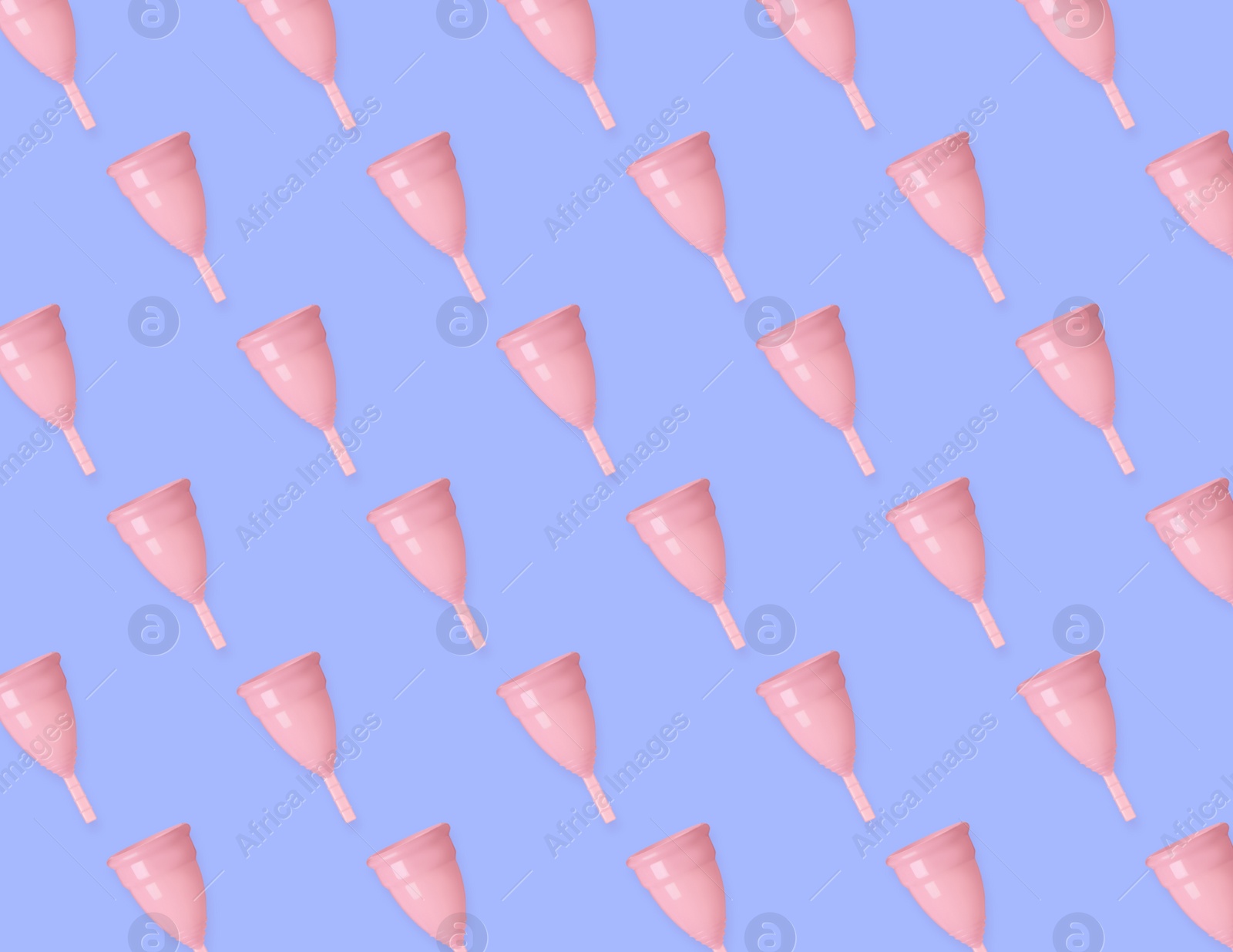 Many pink menstrual cups on light blue background, flat lay. Pattern design Image of Many pink menstrual cups on light blue background, flat lay. Pattern design