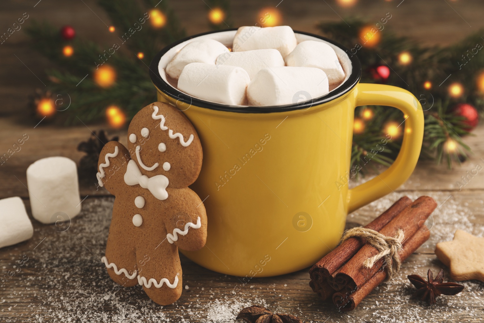 Composition with delicious marshmallow cocoa on wooden table Photo of Composition with delicious marshmallow cocoa on wooden table