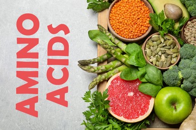 Fresh vegetables, fruits and seeds on light grey table, flat lay. Sources of essential amino acids Image of Fresh vegetables, fruits and seeds on light grey table, flat lay. Sources of essential amino acids