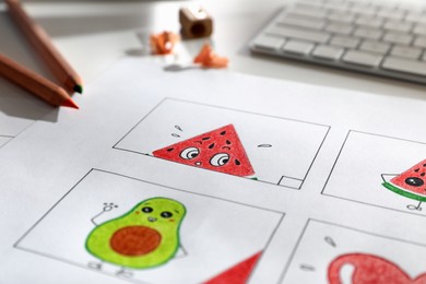 Photo of Storyboard with cartoon sketches at workplace. Pre-production process