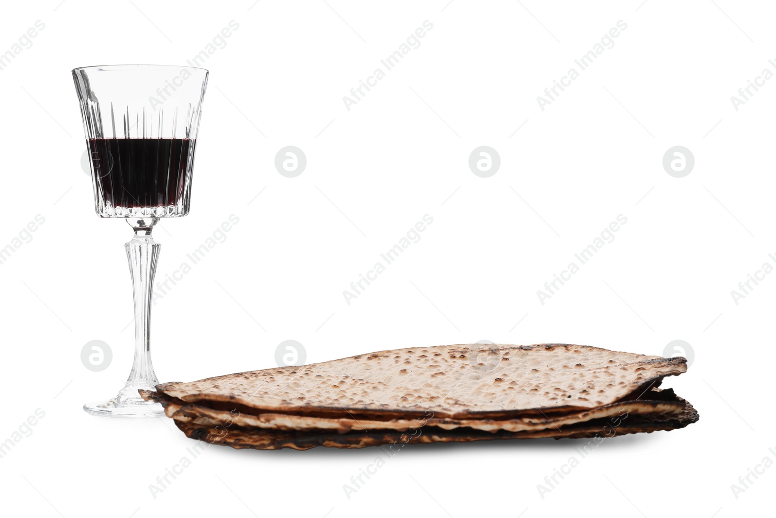 Tasty matzos and wine on white background. Passover (Pesach) celebration Photo of Tasty matzos and wine on white background. Passover (Pesach) celebration