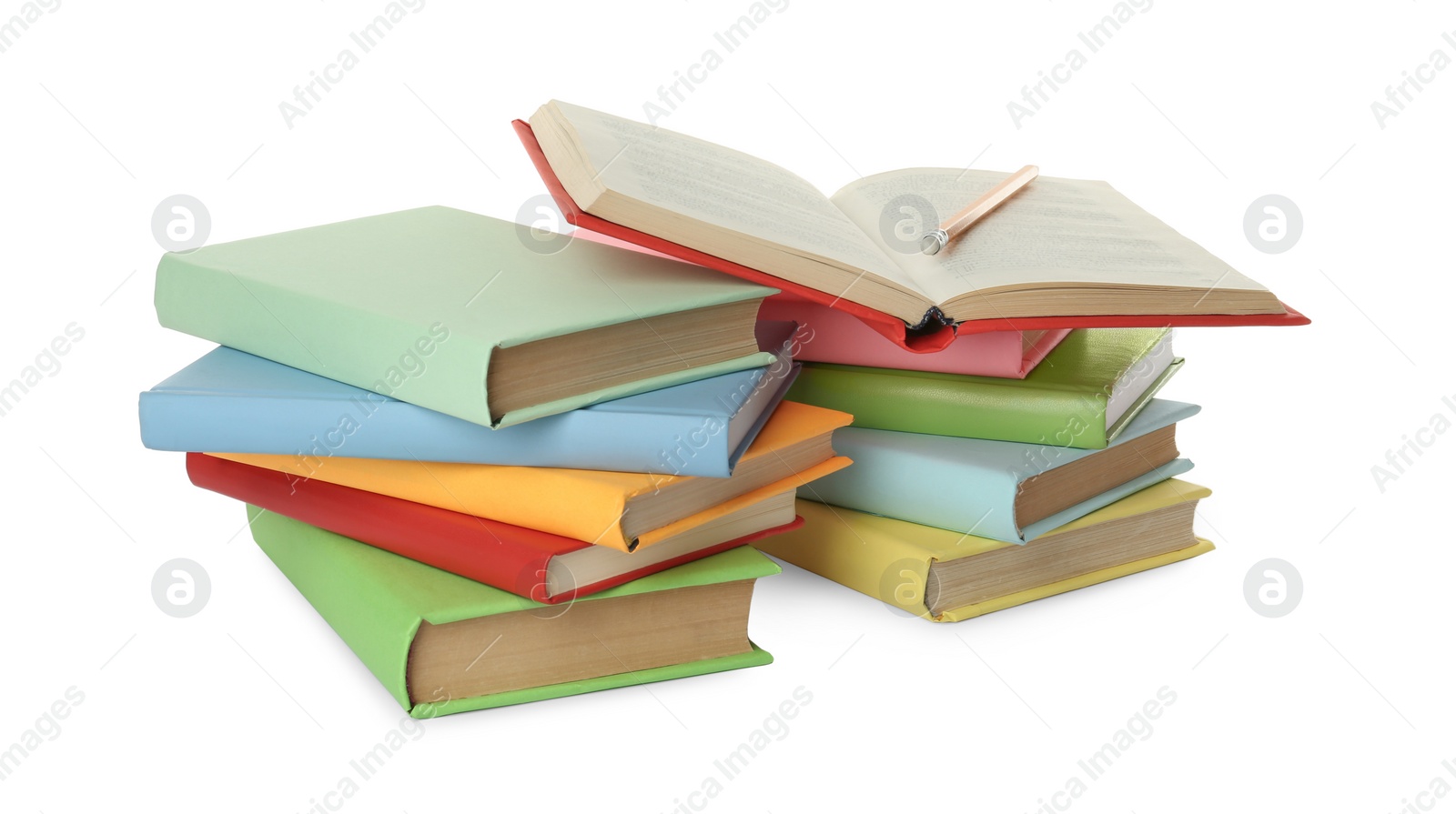 Photo of Many colorful hardcover books with pencil on white background