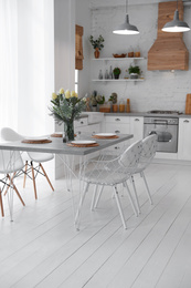 Beautiful kitchen interior with new stylish furniture Photo of Beautiful kitchen interior with new stylish furniture