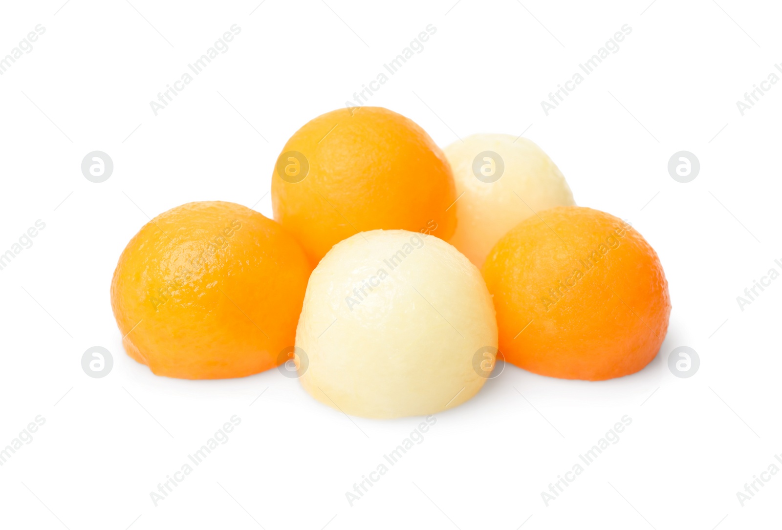 Many different melon balls on white background Photo of Many different melon balls on white background
