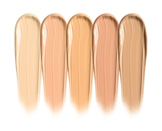 Different shades of liquid skin foundation on white background, top view Image of Different shades of liquid skin foundation on white background, top view