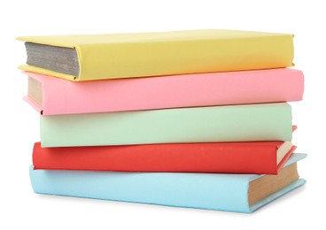 Photo of Many colorful hardcover books on white background