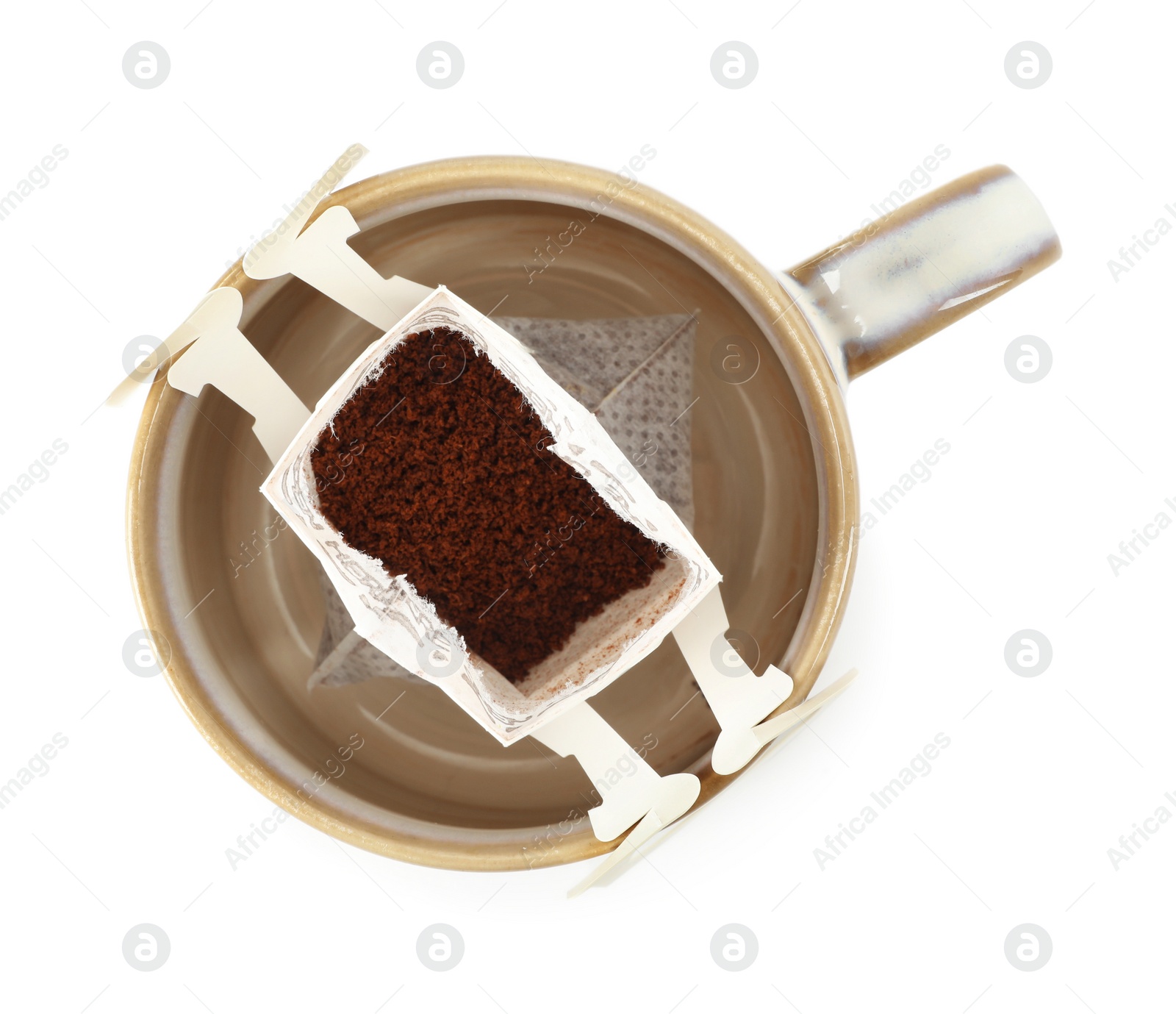 Cup with drip coffee bag isolated on white, top view Photo of Cup with drip coffee bag isolated on white, top view