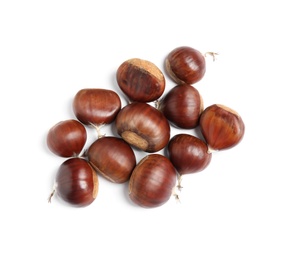 Fresh sweet edible chestnuts on white background, top view Photo of Fresh sweet edible chestnuts on white background, top view