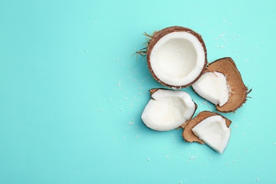 Composition with fresh coconut on color background, top view Photo of Composition with fresh coconut on color background, top view