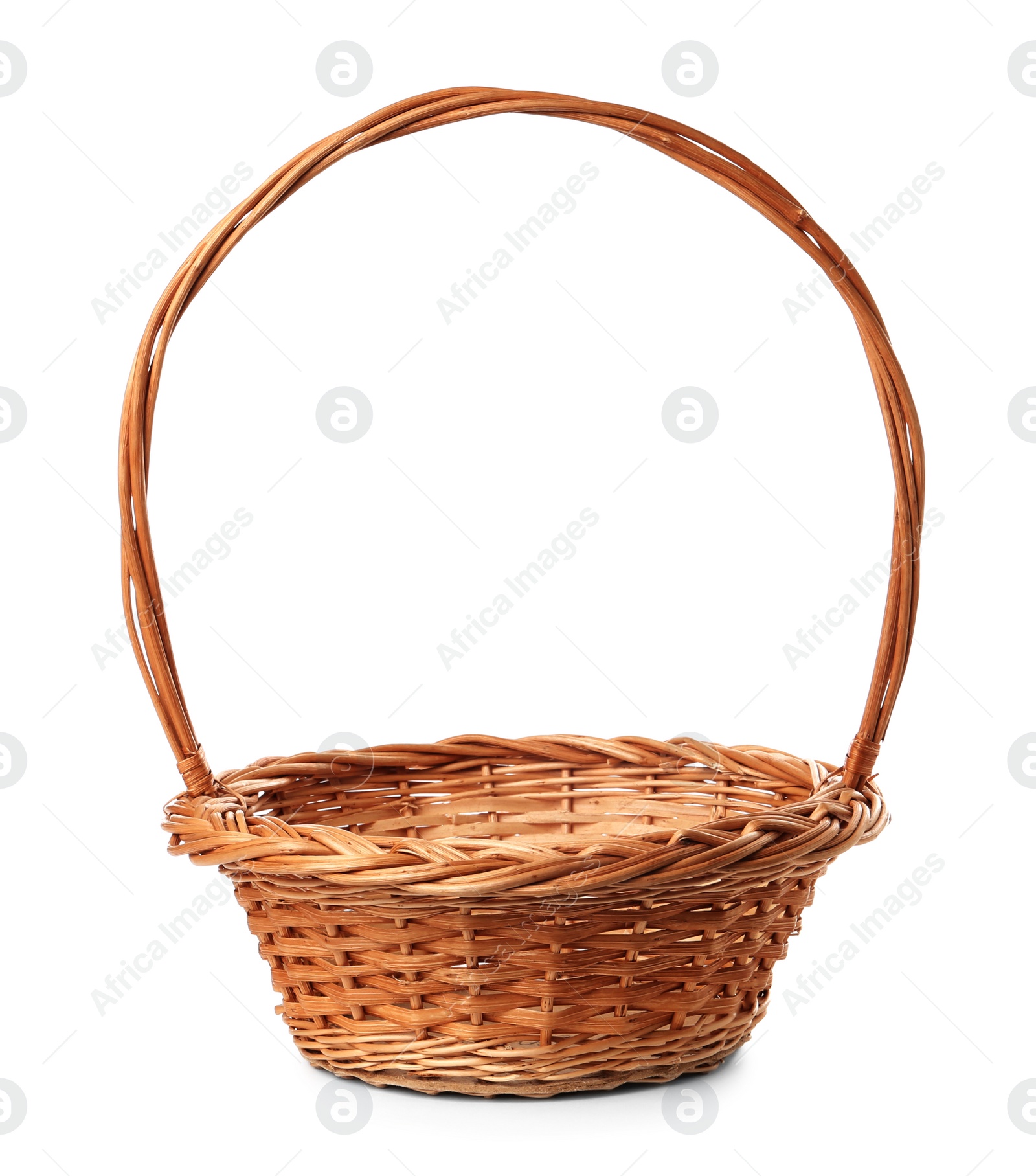 Empty wicker basket isolated on white. Easter item Photo of Empty wicker basket isolated on white. Easter item