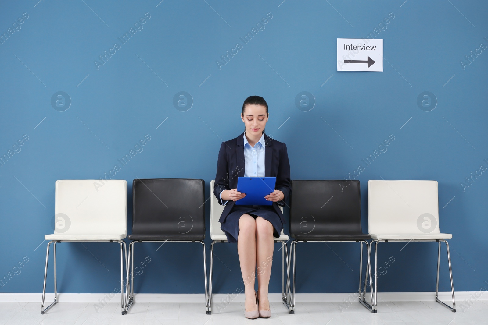 Young woman waiting for job interview, indoors Photo of Young woman waiting for job interview, indoors
