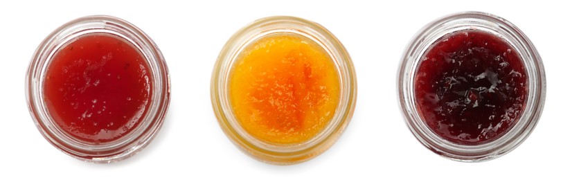 Set with jars of different tasty jam on white background, top view. Banner design Image of Set with jars of different tasty jam on white background, top view. Banner design