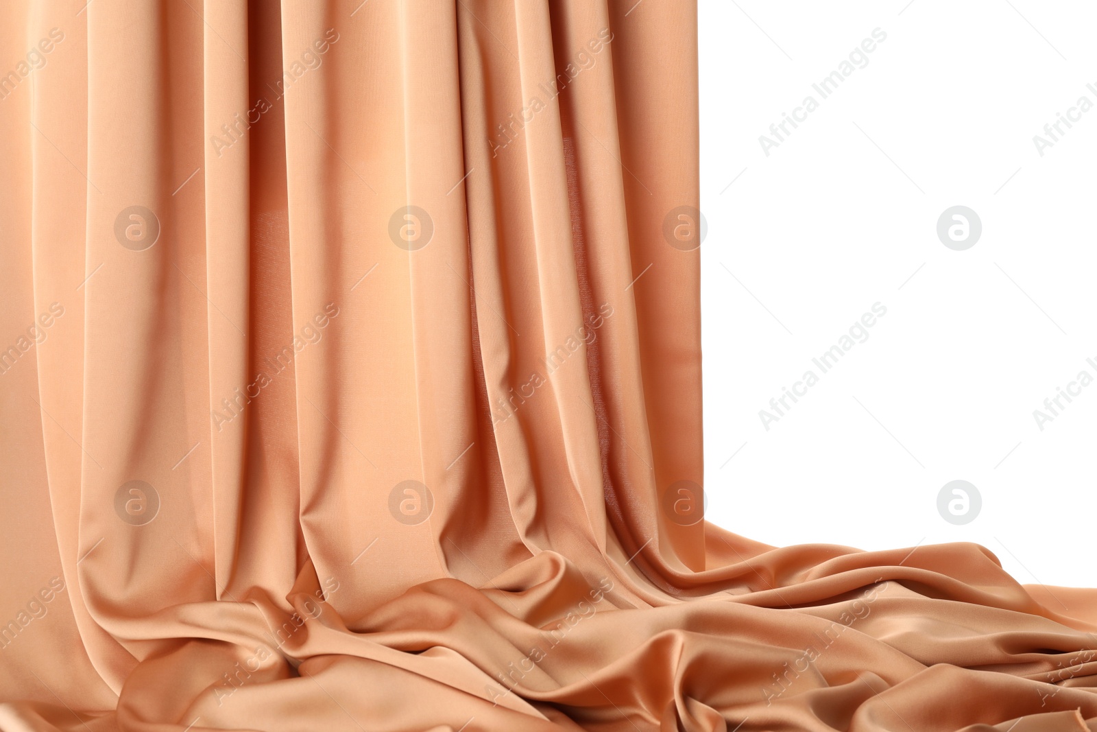 Beautiful delicate peach silk isolated on white Photo of Beautiful delicate peach silk isolated on white
