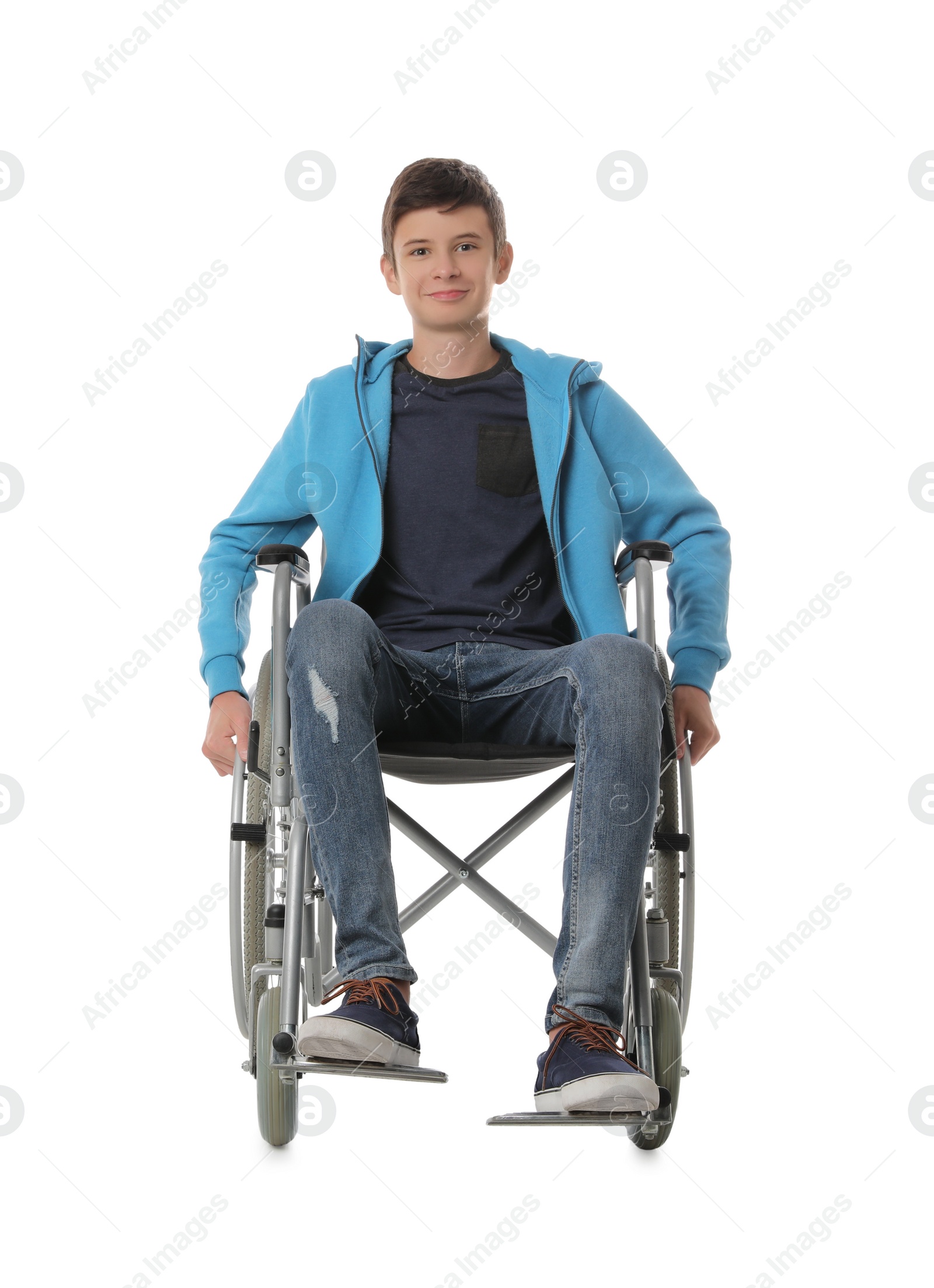 Photo of Teen boy in wheelchair on white background