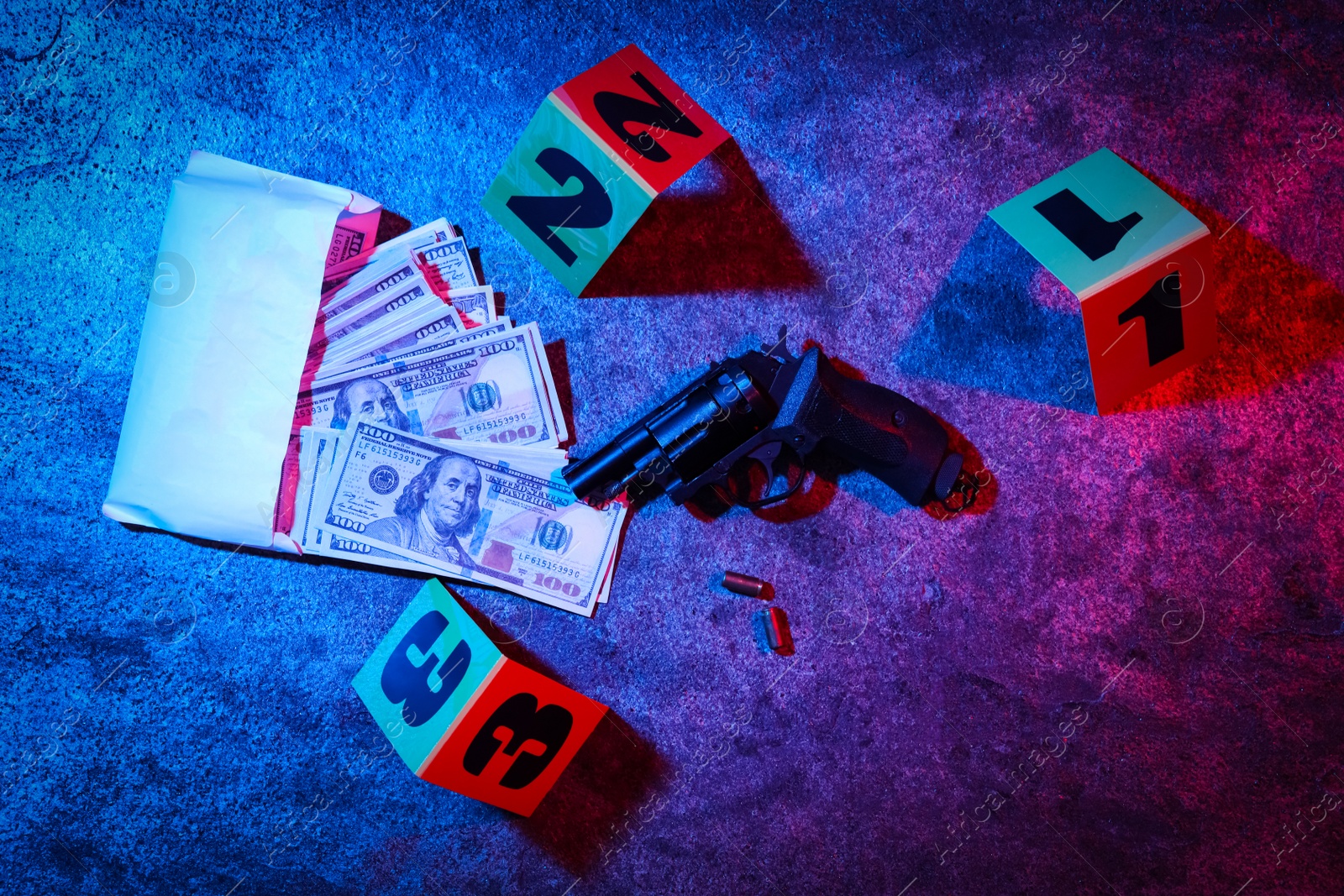 Flat lay composition with evidences on stone background, toned in red and blue. Crime scene Photo of Flat lay composition with evidences on stone background, toned in red and blue. Crime scene