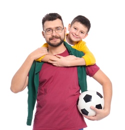 Little boy and his dad with soccer ball on white background Photo of Little boy and his dad with soccer ball on white background
