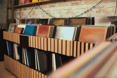 Rack with different vinyl records in store Image of Rack with different vinyl records in store