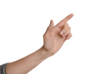 Woman pointing at something on white background, closeup Photo of Woman pointing at something on white background, closeup