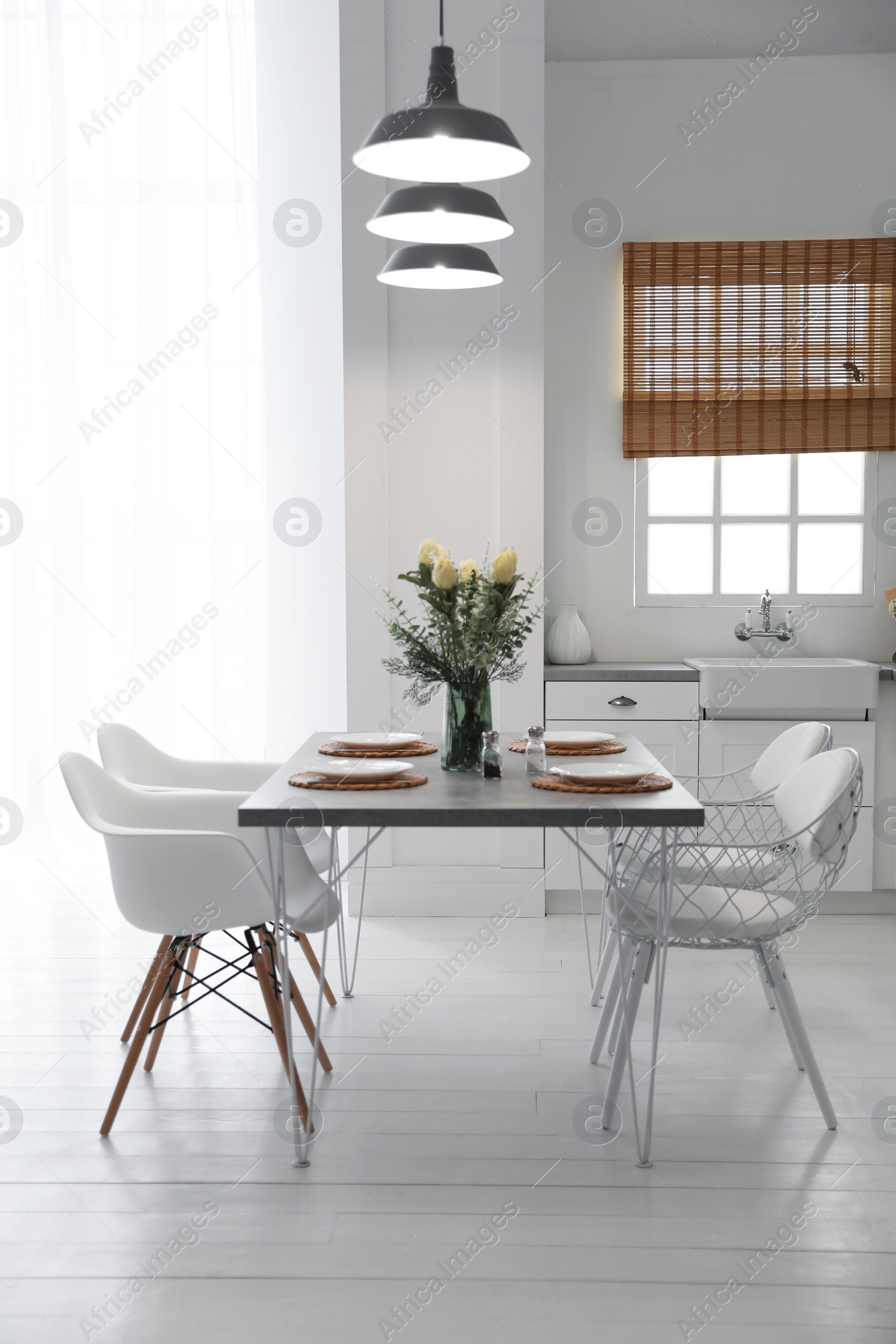 Beautiful dining room interior with new stylish furniture Photo of Beautiful dining room interior with new stylish furniture