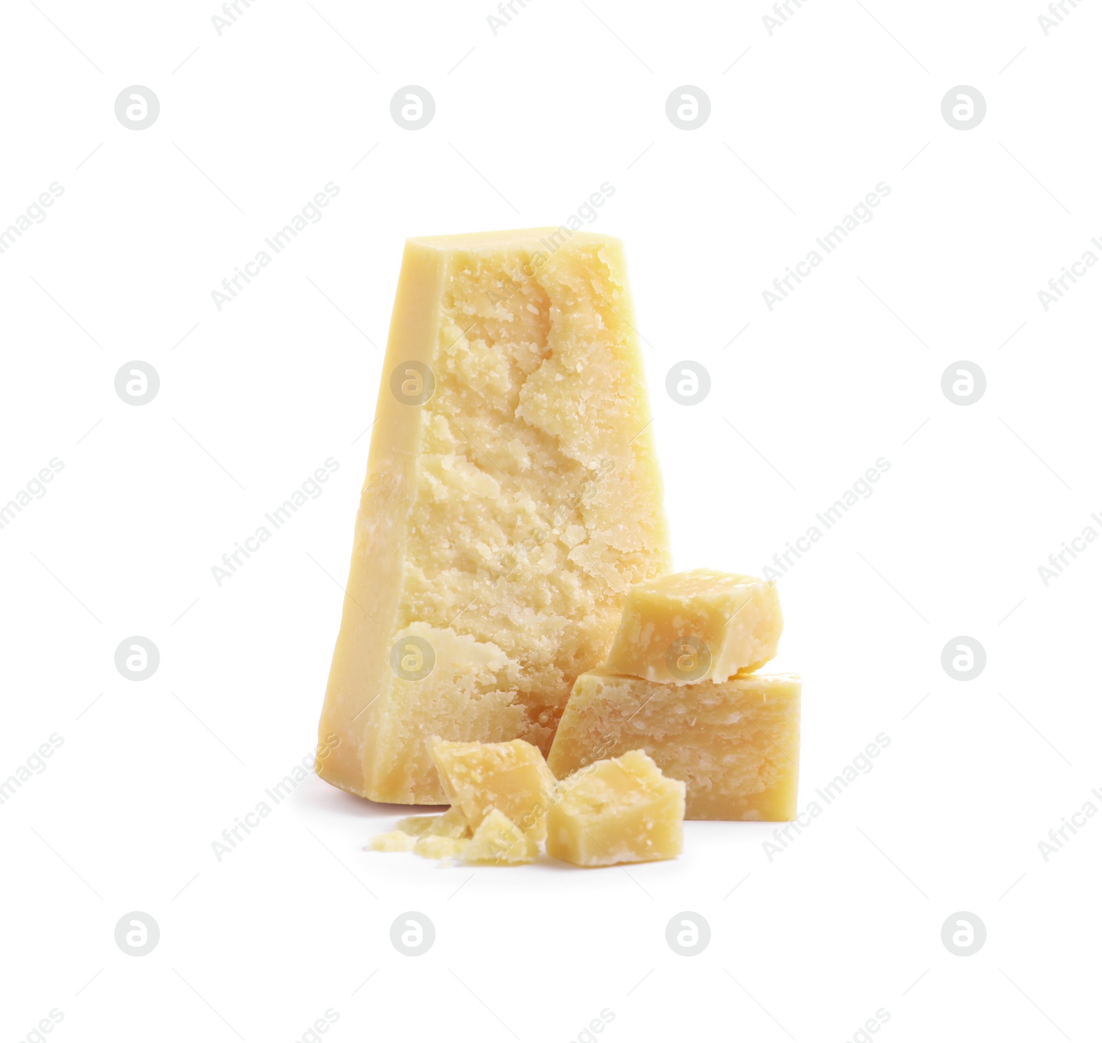 Pieces of delicious parmesan cheese on white background Photo of Pieces of delicious parmesan cheese on white background