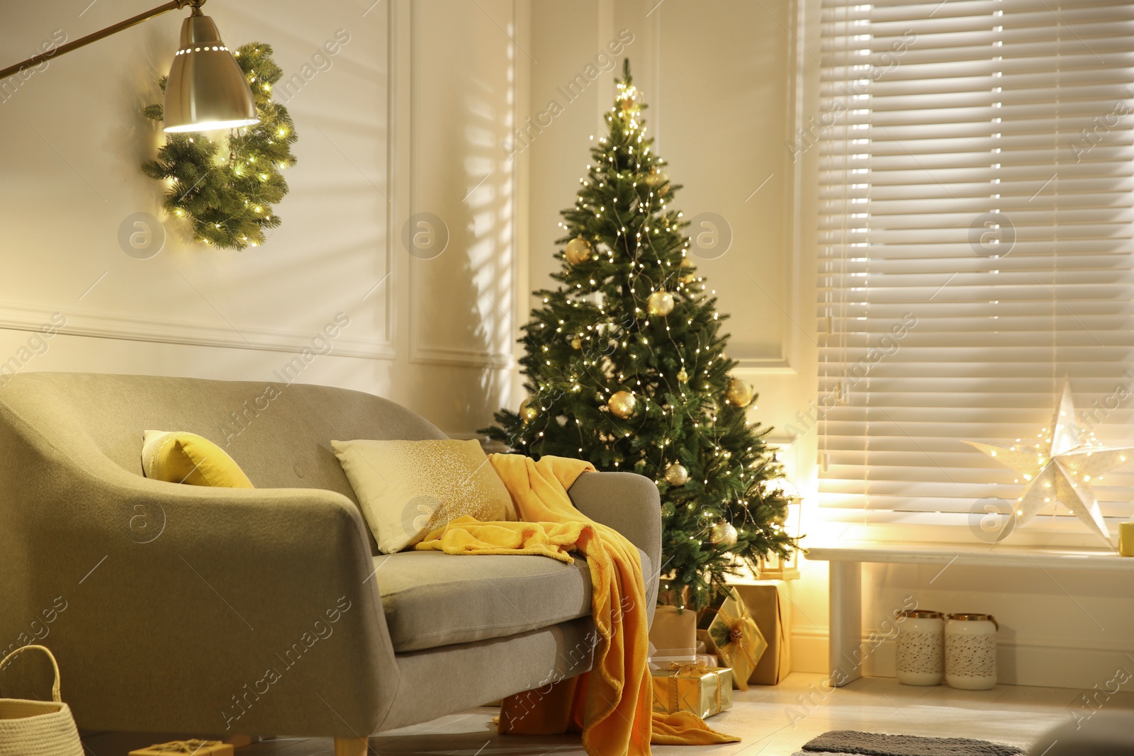 Photo of Stylish room with Christmas decorations. Festive interior design