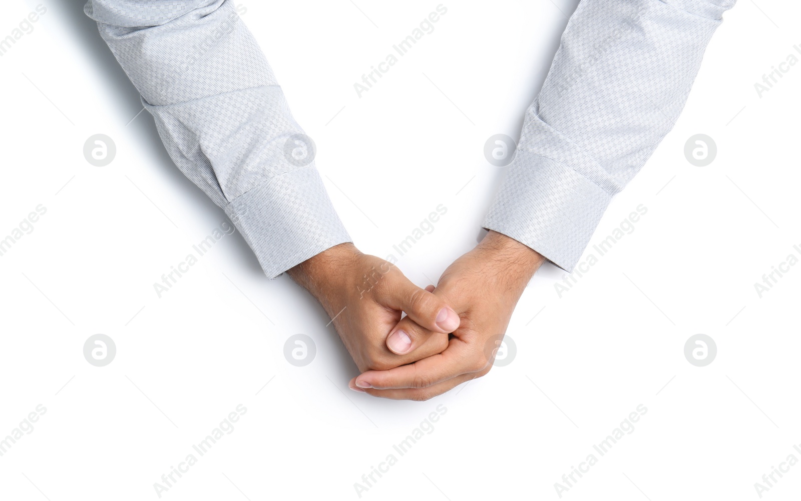 Man on white background, top view. Closeup of hands Photo of Man on white background, top view. Closeup of hands