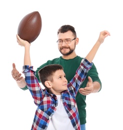 Photo of Little boy and his dad with ball on white background