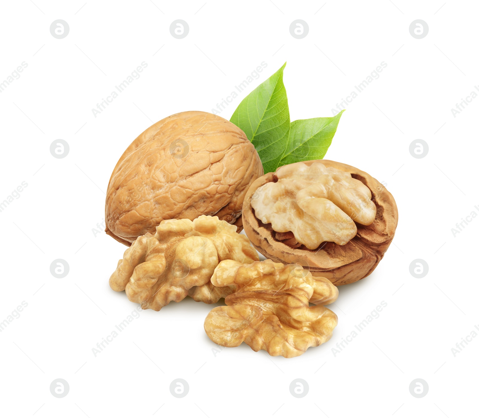 Tasty walnuts and green leaves on white background Image of Tasty walnuts and green leaves on white background