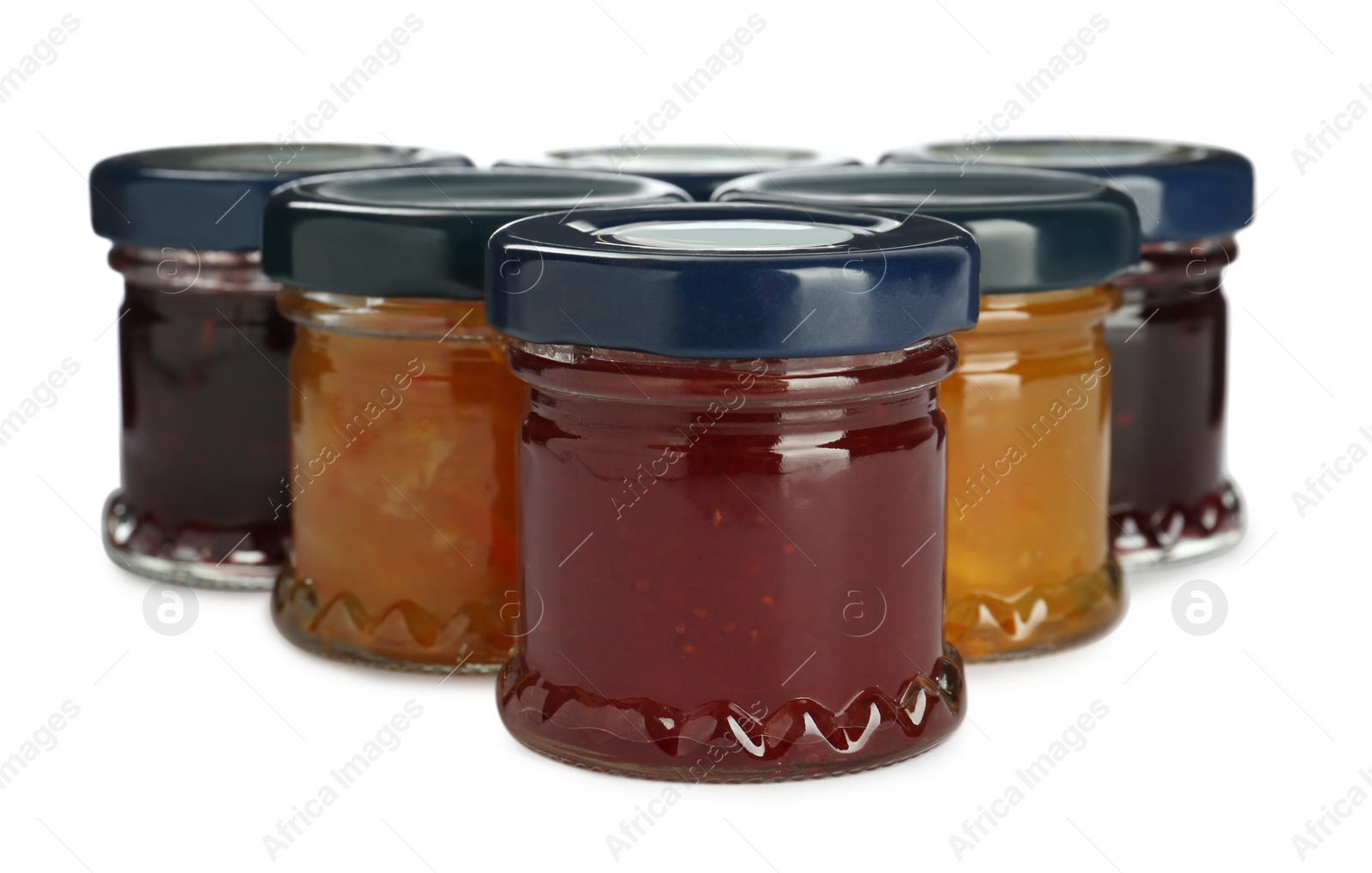 Photo of Jars with different jams on white background