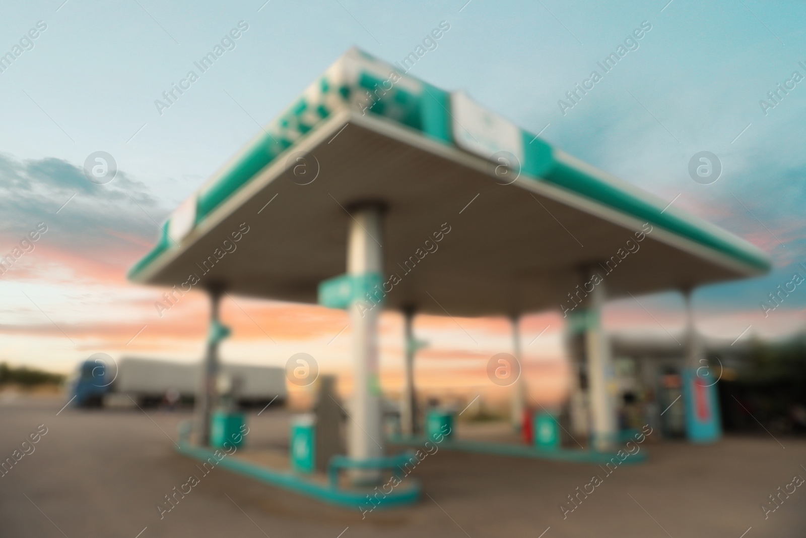 Blurred view of modern gas filling station beside road Image of Blurred view of modern gas filling station beside road