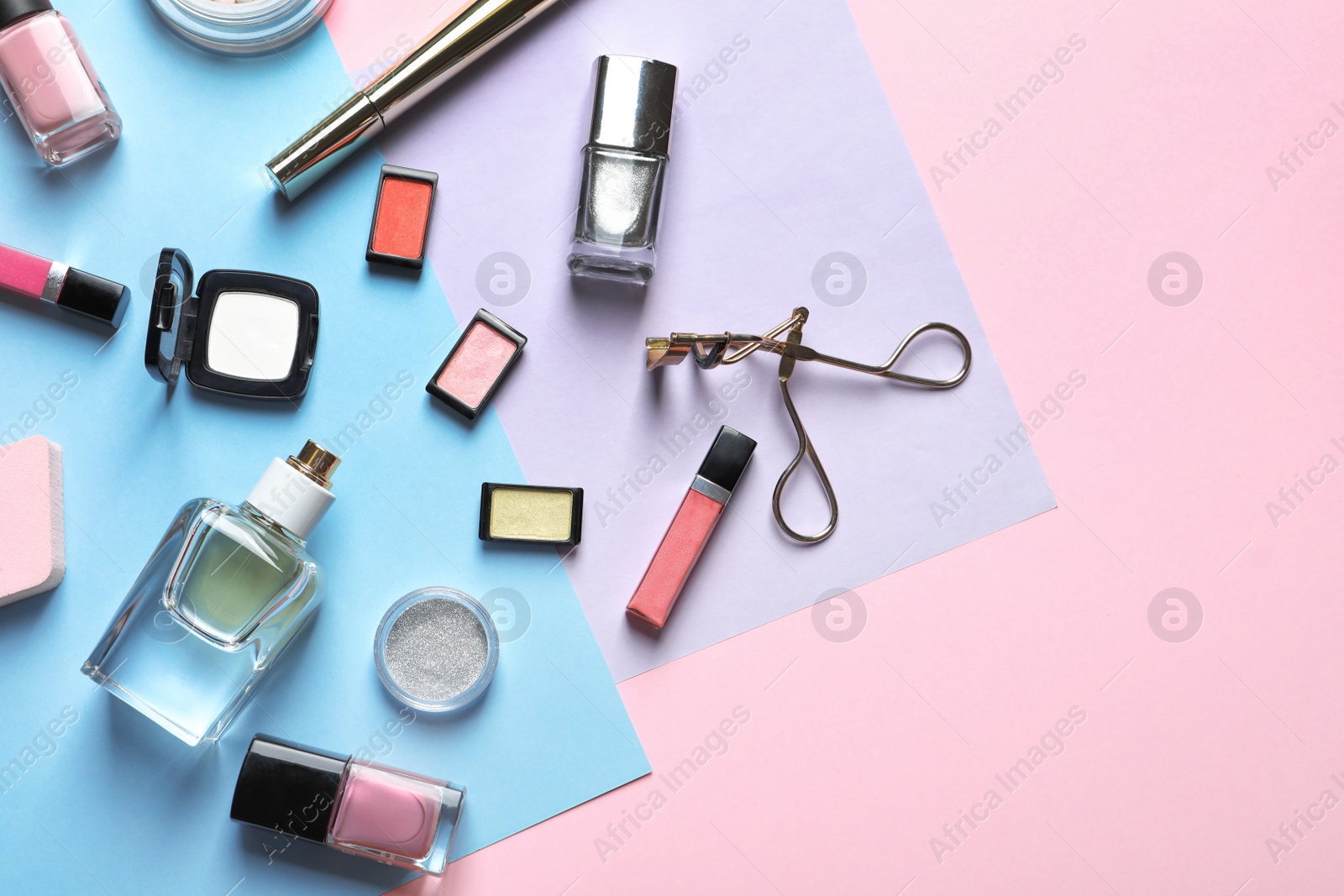 Decorative cosmetics and tools of professional makeup artist on color background Photo of Decorative cosmetics and tools of professional makeup artist on color background