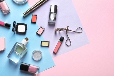 Decorative cosmetics and tools of professional makeup artist on color background Photo of Decorative cosmetics and tools of professional makeup artist on color background