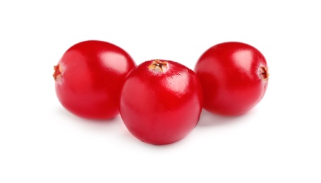 Fresh red cranberries on white background. Healthy snack Photo of Fresh red cranberries on white background. Healthy snack