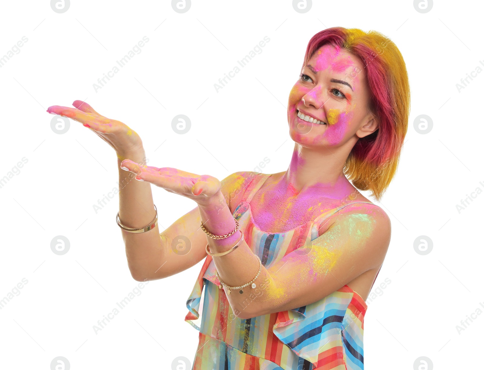 Woman covered with colorful powder dyes on white background. Holi festival celebration Photo of Woman covered with colorful powder dyes on white background. Holi festival celebration