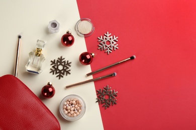 Flat lay composition with decorative cosmetic products on color background. Winter care Photo of Flat lay composition with decorative cosmetic products on color background. Winter care