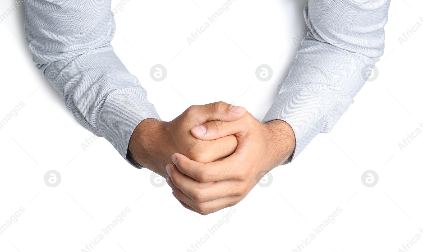 Man on white background, top view. Closeup of hands Photo of Man on white background, top view. Closeup of hands