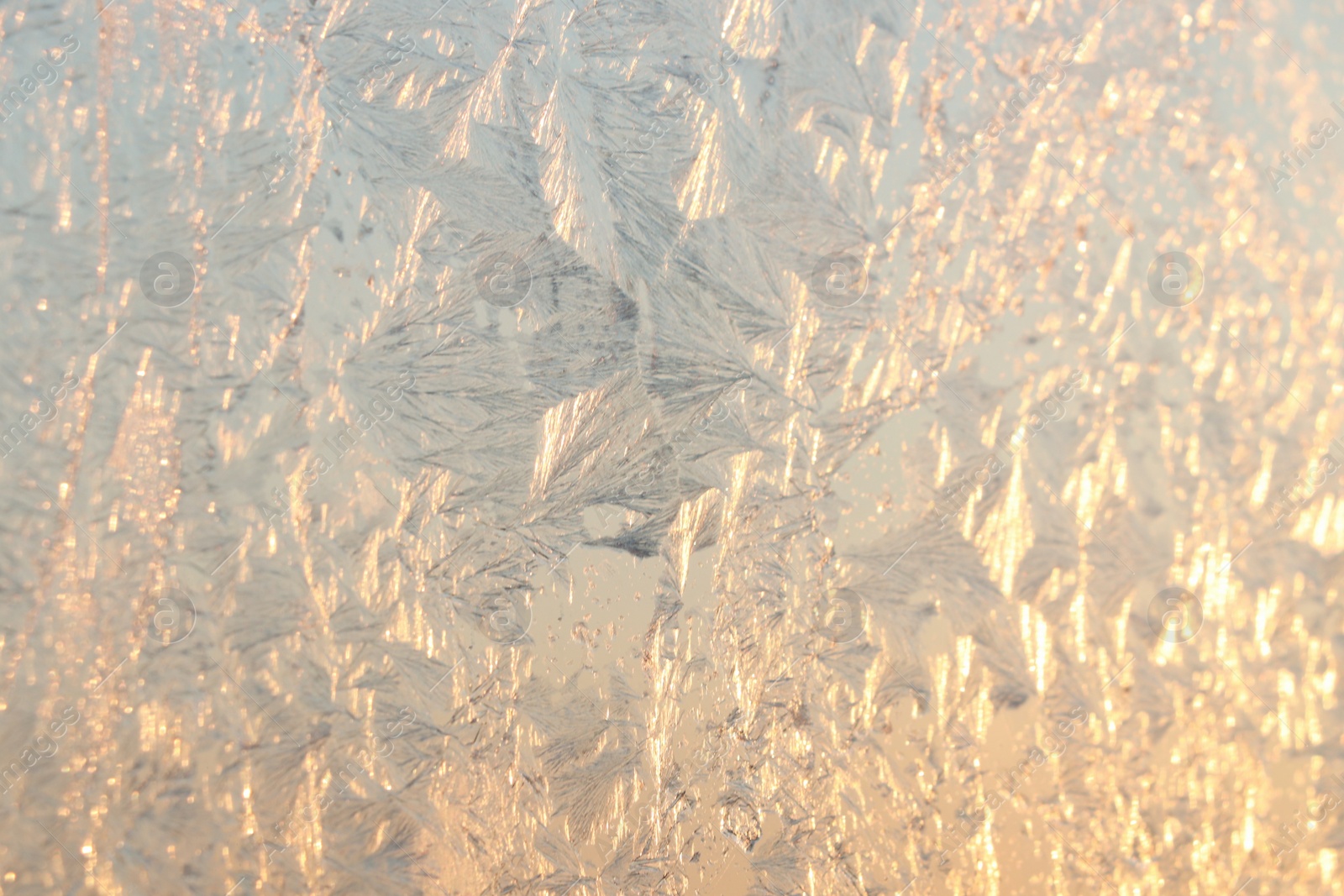Beautiful frosty window as background, closeup. Winter morning Photo of Beautiful frosty window as background, closeup. Winter morning