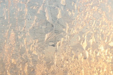 Photo of Beautiful frosty window as background, closeup. Winter morning