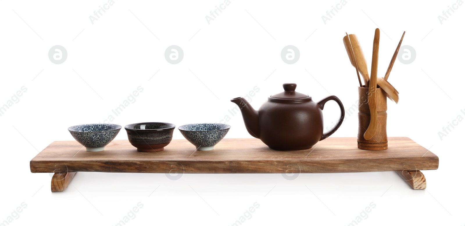 Beautiful set for traditional tea ceremony on white background Photo of Beautiful set for traditional tea ceremony on white background