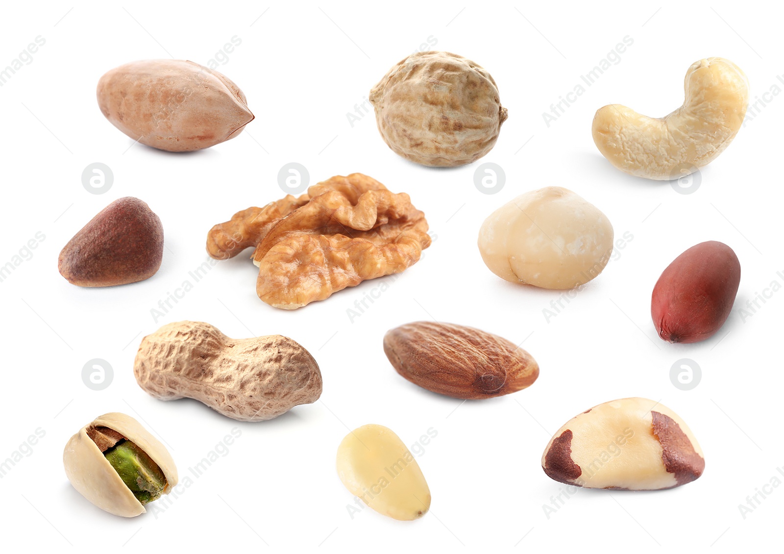 Set with different tasty nuts on white background Image of Set with different tasty nuts on white background