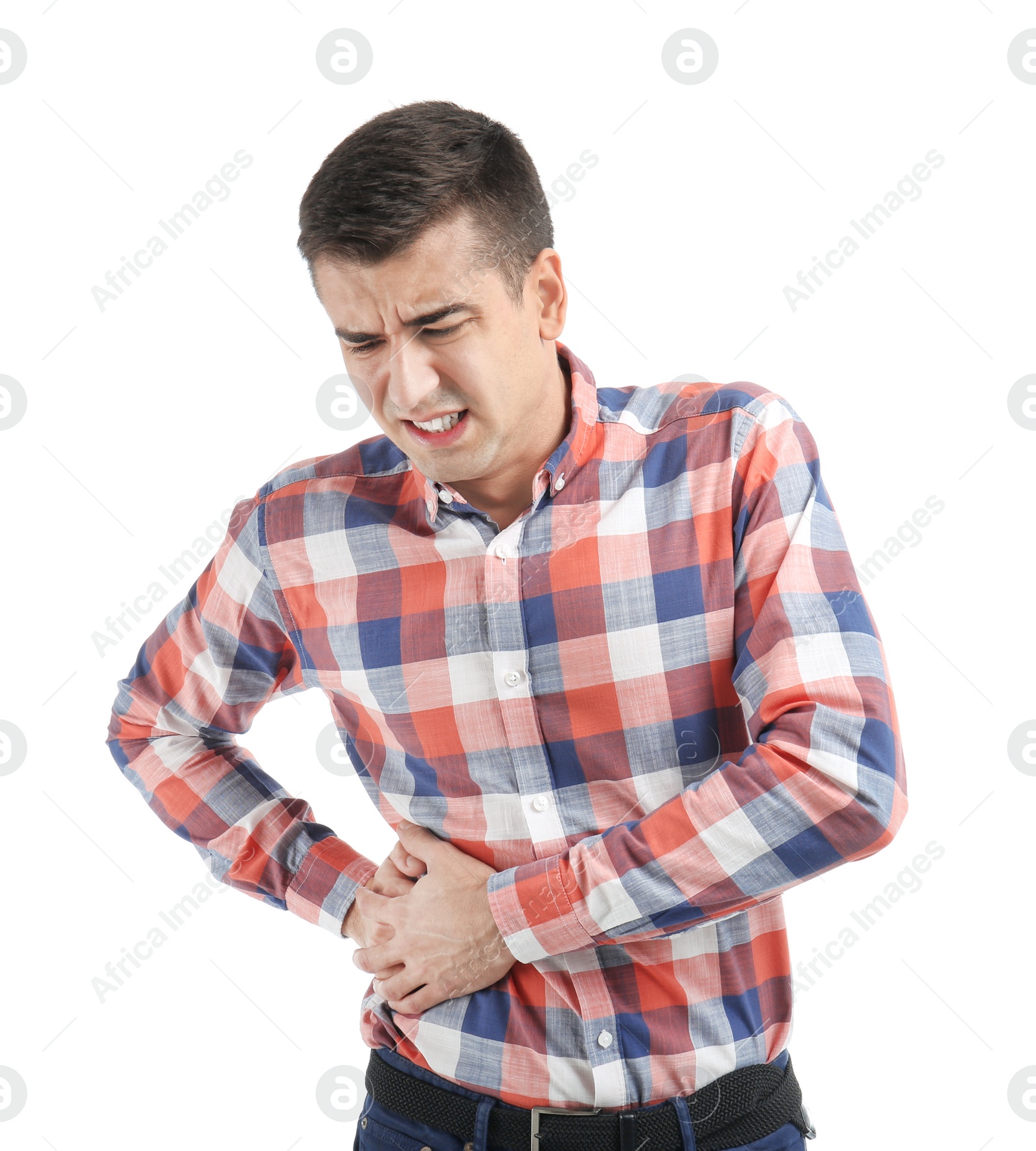 Man suffering from flank pain on white background Photo of Man suffering from flank pain on white background