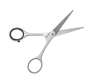 Professional hairdresser scissors isolated on white. Haircut tool Photo of Professional hairdresser scissors isolated on white. Haircut tool