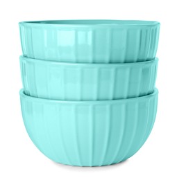 Elegant new turquoise bowls on white background Photo of Elegant new turquoise bowls on white background