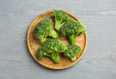 Fresh green broccoli on wooden table, top view Photo of Fresh green broccoli on wooden table, top view