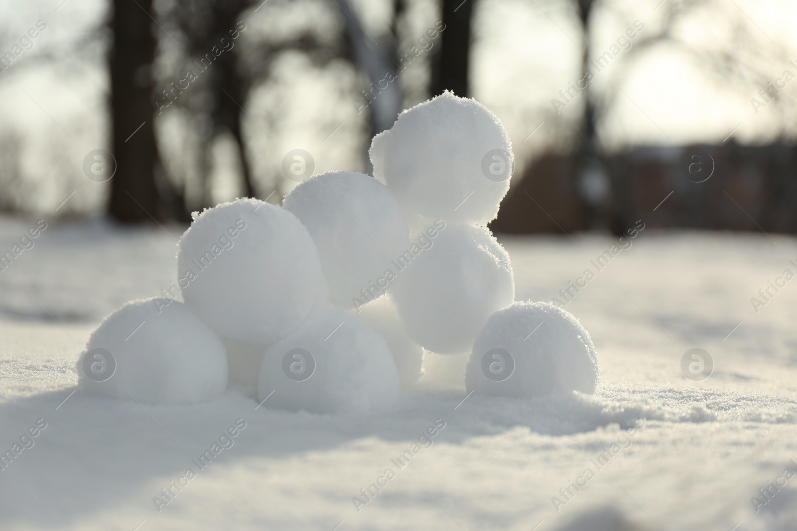 Perfect round snowballs on snow outdoors, closeup Photo of Perfect round snowballs on snow outdoors, closeup