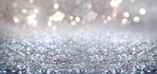 Shiny glitter and blurred lights on background, banner design. Bokeh effect Image of Shiny glitter and blurred lights on background, banner design. Bokeh effect